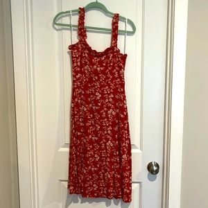 Red Midi length dress with white floral pattern